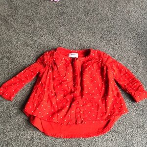 Red with white polka dot shirt